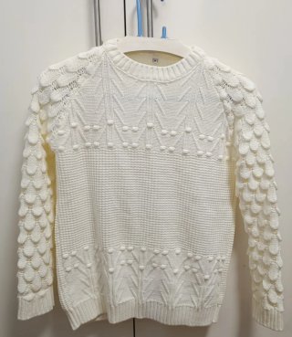 Jersey beige de punto.