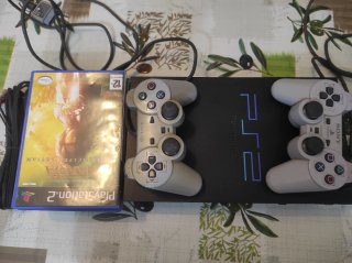 Consola PlayStation 2 (PS2) con accesorios