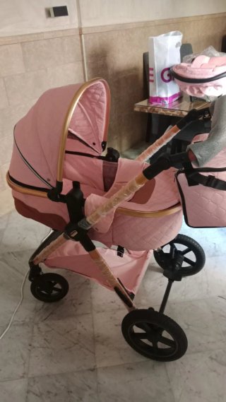 Carro de bebé rosa