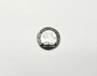Emblema volante Mercedes AMG plata y negro 49 mm