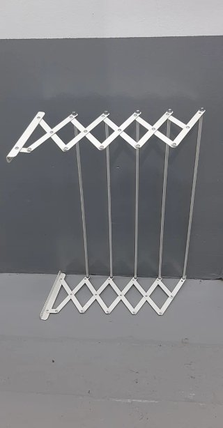 Tendedero extensible de pared