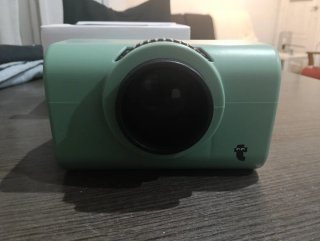 Proyector móvil verde