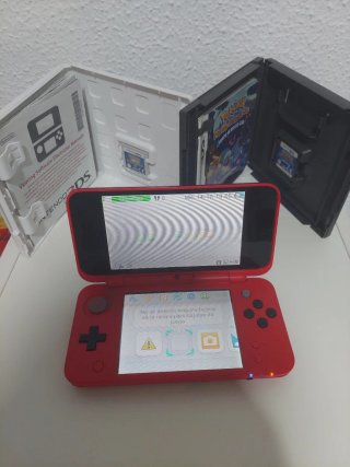 Nintendo 2DS Rossa pokeball con due giochi Pokémon