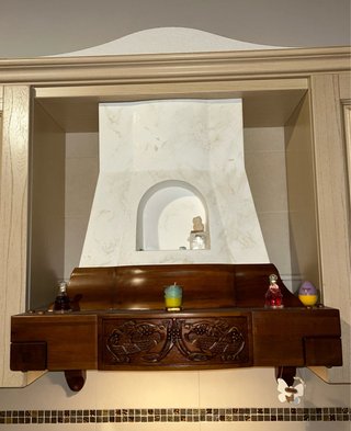 Cappa cucina in legno con decorazioni