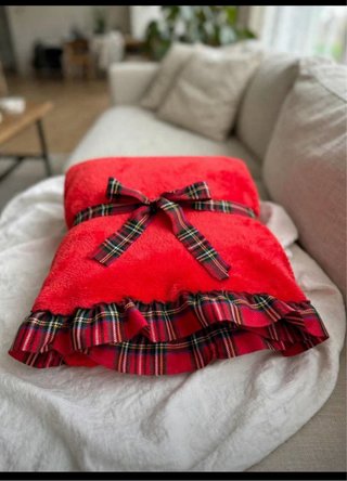 Coperta plaid natalizia con fiocco