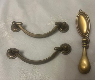 Tiradores y colgante bronce