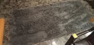 Tappeto in pelo grigio