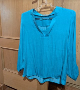 Blusa azul turquesa
