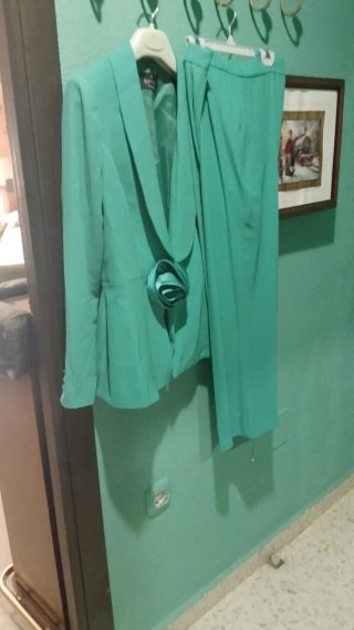 Traje de chaqueta y pantalón verde