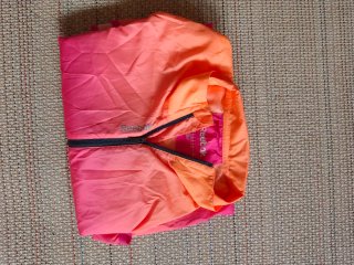 Giacca a vento Reebok fucsia e arancione