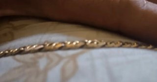 Esclava de pulsera dorada