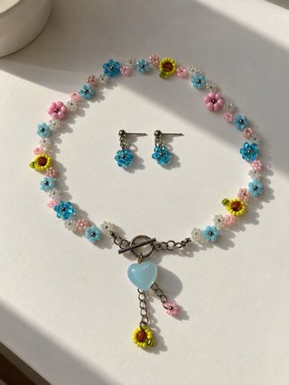 Conjunto collar y pendientes flores Zara