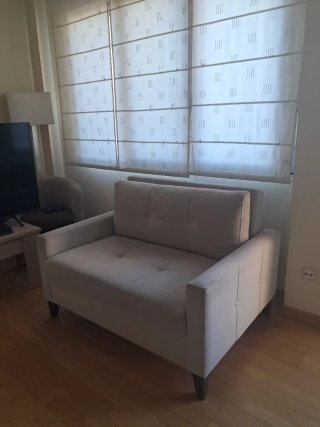 Sofá cama / Puff beige Sofá Marca el Corte inglés