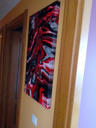 Cuadro Abstracto con Tonos Rojos y Negros