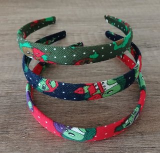 Diademas infantiles en tela con estampado navideño