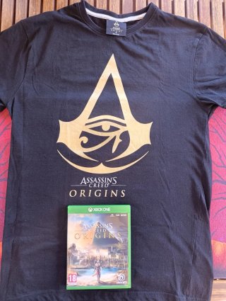 Juego Xbox One Assassin's Creed Origins + Camiseta