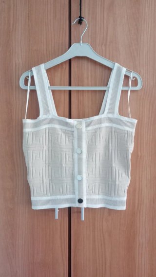 Top de punto beige