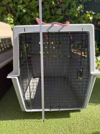 Transportín para perro grande.