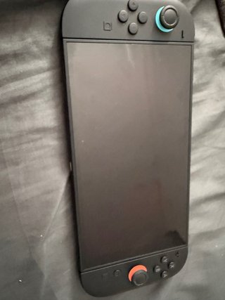 Consola Nintendo Switch 2 + 2 juegos y su caja