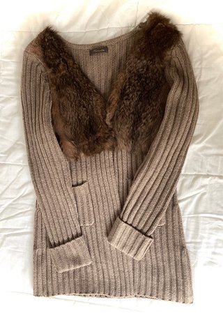 Chaqueta de punto con detalle de pelo.