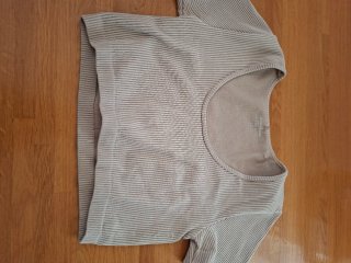 Top de deporte beige talla M