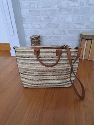 Bolso de mano trenzado