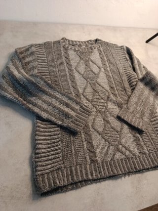 Jersey de punto con trenzados