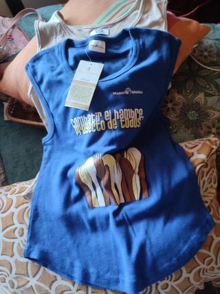 Lote 2 Camisetas Algodón Manos Unidas