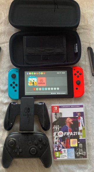 Nintendo Switch + FIFA 21 + Mando Pro + Funda