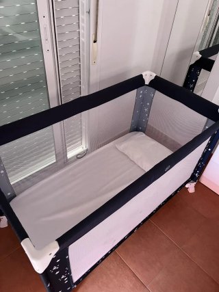 Cuna de viaje con embalaje