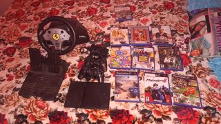 Consola PlayStation 2 con Volante y Juegos