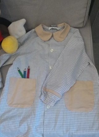 Bata escolar de cuadros