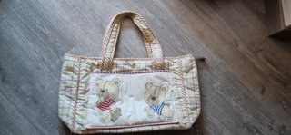 Bolso cambiador de tela con diseño de ositos
