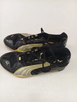 Zapatillas Puma Negras y Doradas