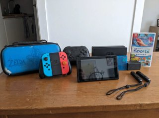 Nintendo Switch V1 con accesorios y juegos