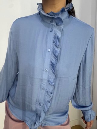 Blusa de manga larga con volantes