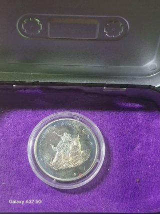 Moneda Conmemorativa en Cápsula Protectora