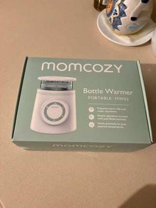 Calentador de biberones portátil Momcozy MW03