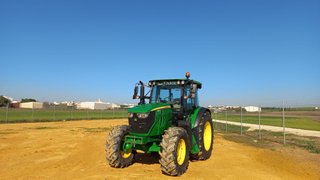 Tractor John Deere 6115 MC con Pala León