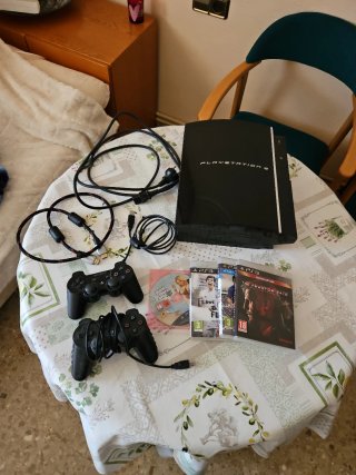 PlayStation 3 + 2 mandos + 5 juegos