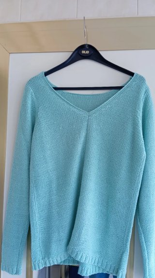 Jersey de punto turquesa. Talla M.