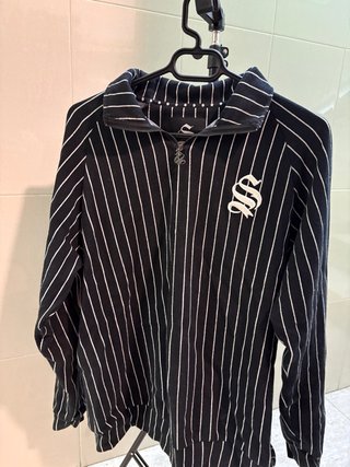 Sudadera con cremallera a rayas