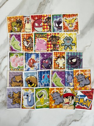 Lote de 28 cromos Pokémon Merlín