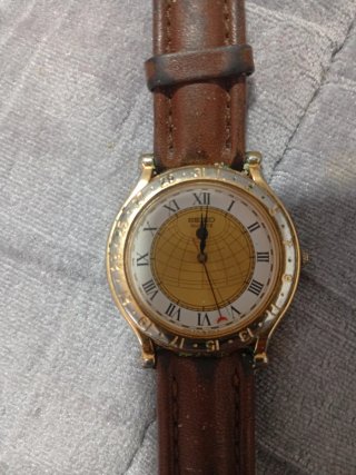 Orologio Seiko con quadrante mappamondo