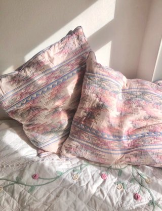 Two large vintage cushion covers