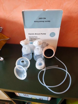 Extractor de leche eléctrico doble ( sin usar)