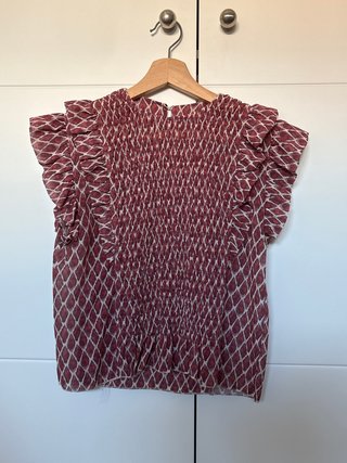 Blusa con volantes y estampado