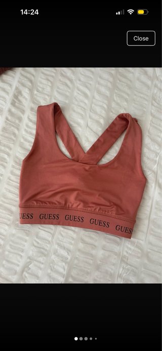 Top deportivo Guess rosa
