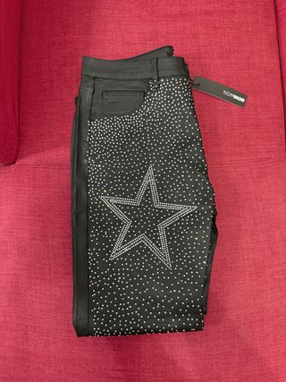 Pantalones Negros NOVAMEN con Estampado de Estrell