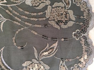 Jersey con bordados y lentejuelas